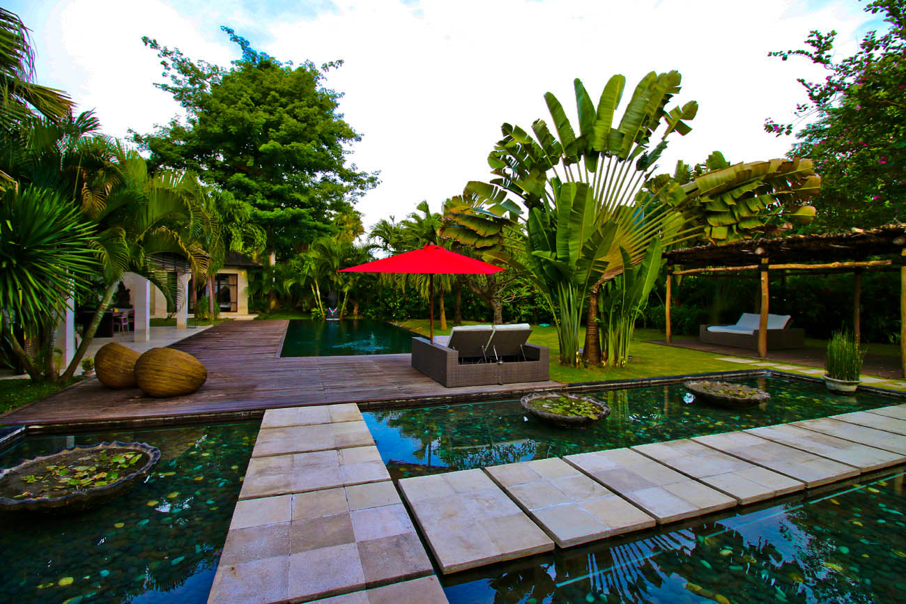 The villa with fish pond with clear water awaits you here